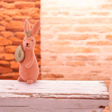 Lade das Bild in den Galerie-Viewer, Osterhase mit Ei Orange Kunststoff beflockt Dekohase Hase Osterdekoration modern