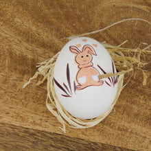 Lade das Bild in den Galerie-Viewer, Ostereier 12er Set braun weiß mit Osterhasen