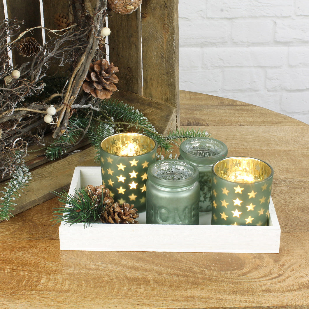 Teelichthalter 4St., Glas auf Holzplatte, mit Zweigen + Tannenzapfen, grün matt